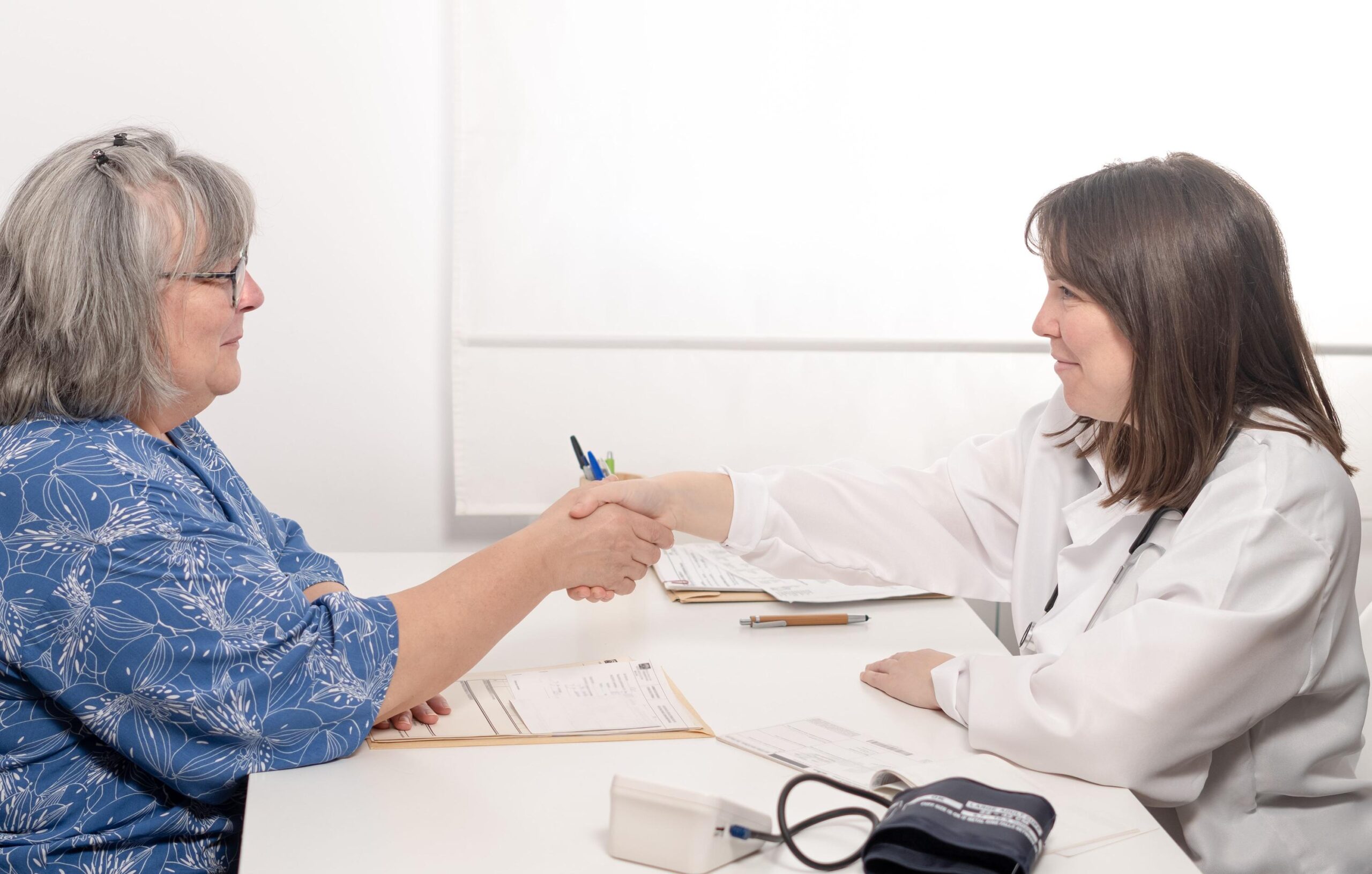 doctor and patient shaking hands