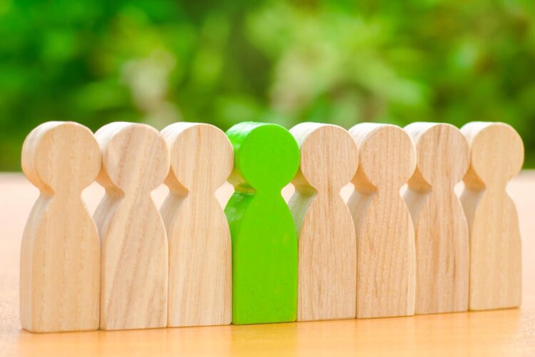 team wooden figures of people