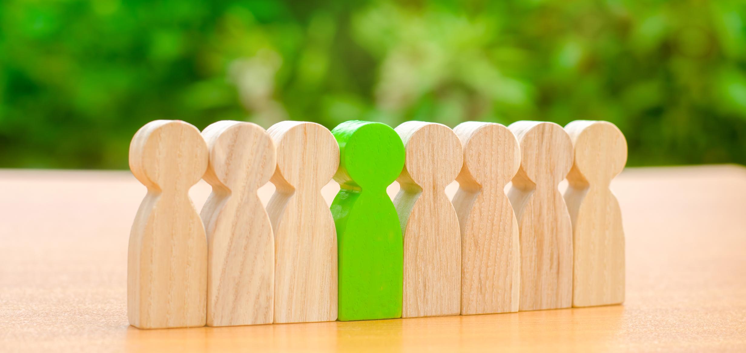 team wooden figures of people
